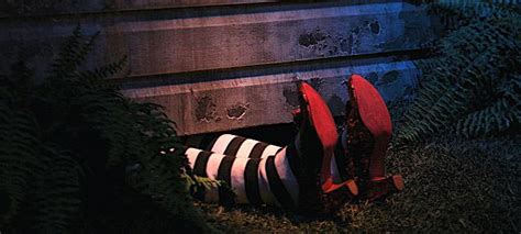 Analyzing the Impact of the Wicked Witch of the West's Legs Under the House